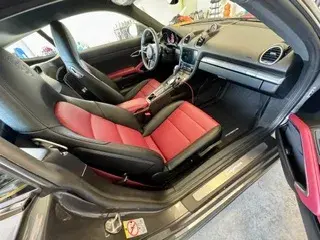 Sports car interior with red and black leather seats